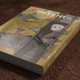 A copy of The Witcher: Ronin manga sits on a table.